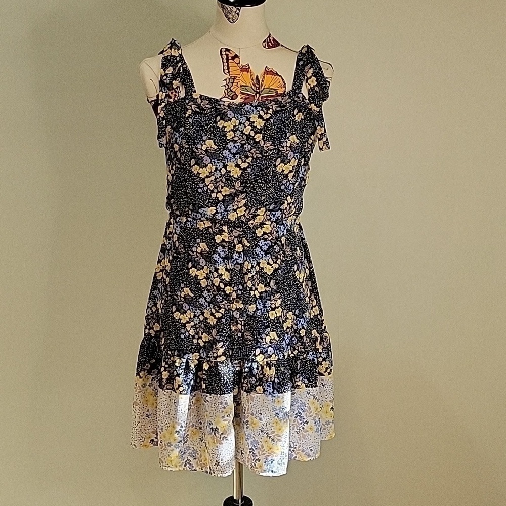 JUN & IVY blue & yellow floral dress.  Ties at shoulder size is Large Juniors.